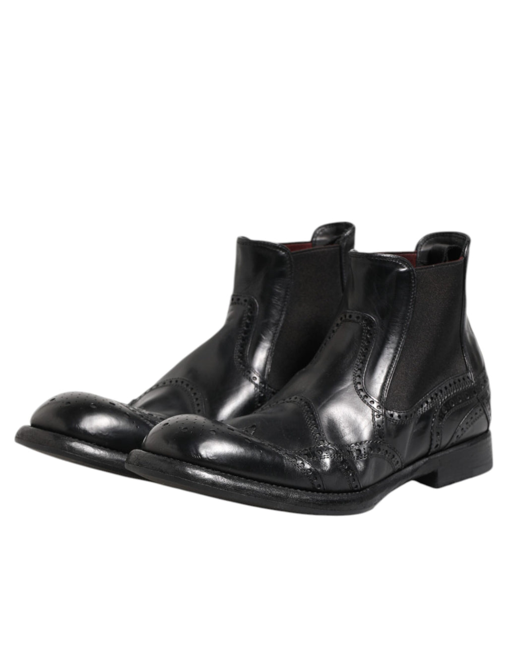 Chaussures bottines noires en cuir Dolce & Gabbana, slip-on, avec semelles élégantes et design chic pour femme.
