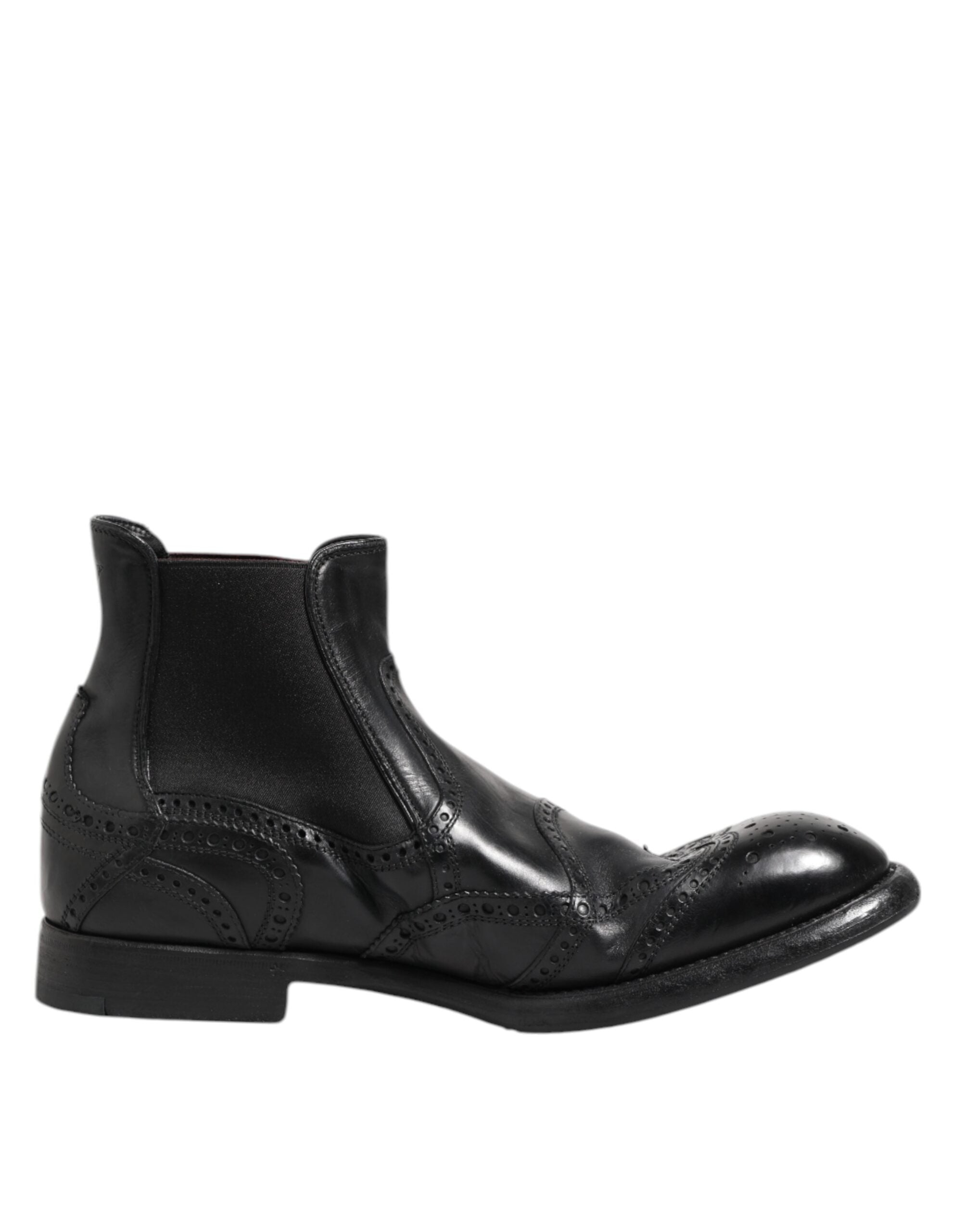 Bottines noires en cuir Dolce & Gabbana à enfiler, élégantes et modernes, pour femmes.