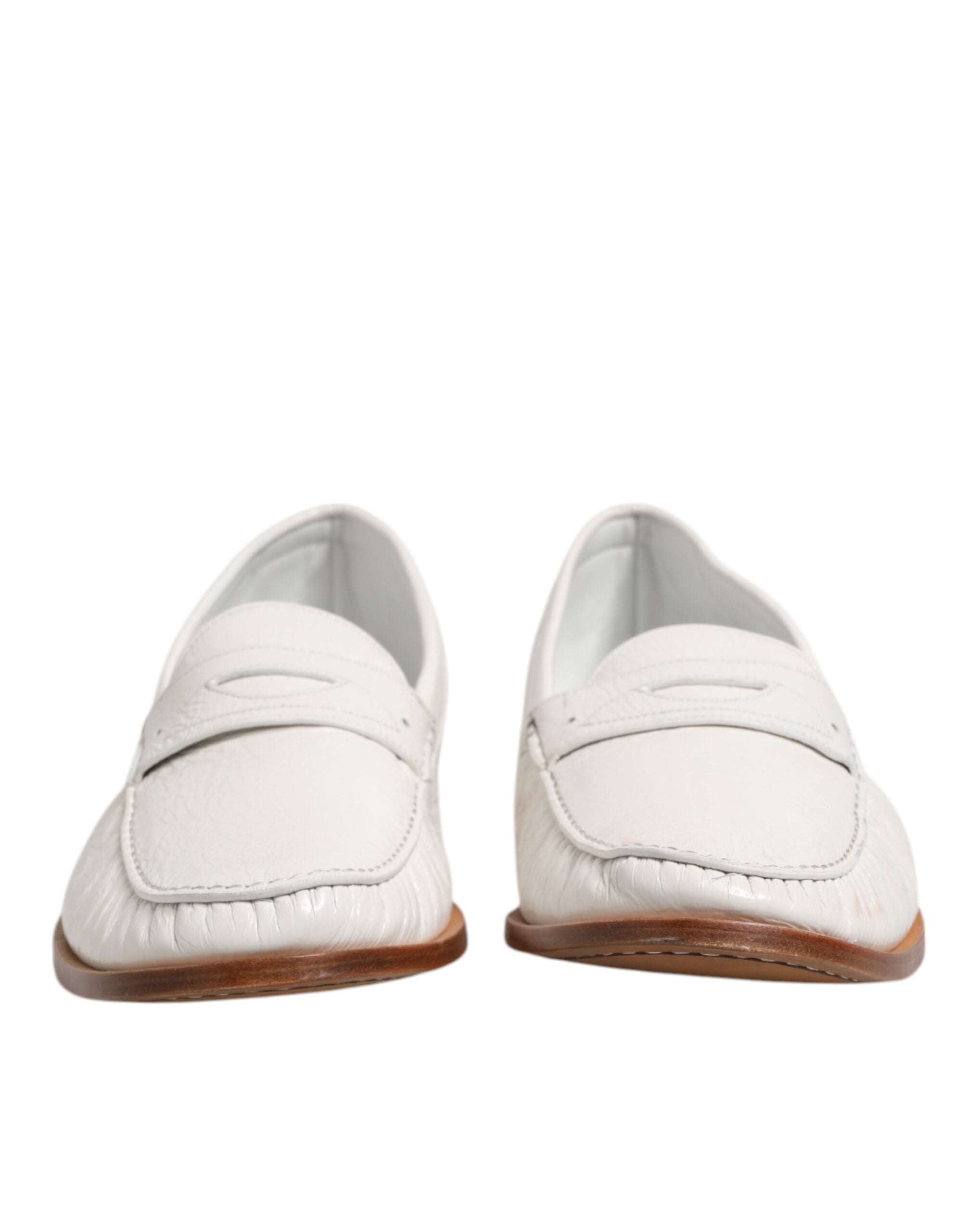 Mocassins en cuir blanc Dolce & Gabbana, chaussures slip-on élégantes pour homme avec finition soignée.