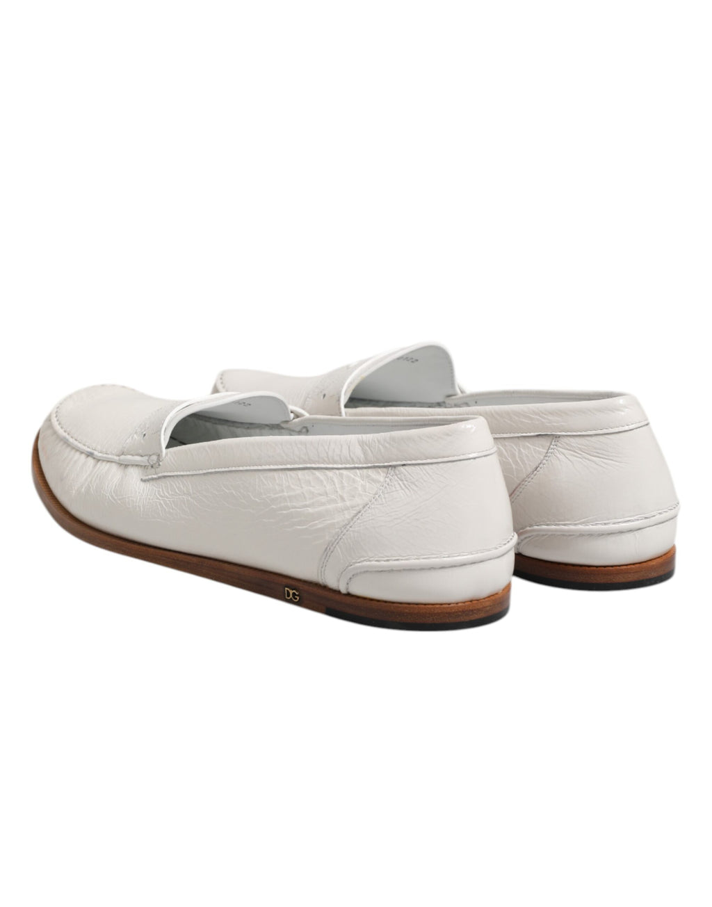 Chaussures mocassins en cuir blanc Dolce & Gabbana, chaussons slip-on élégants pour homme ou femme.