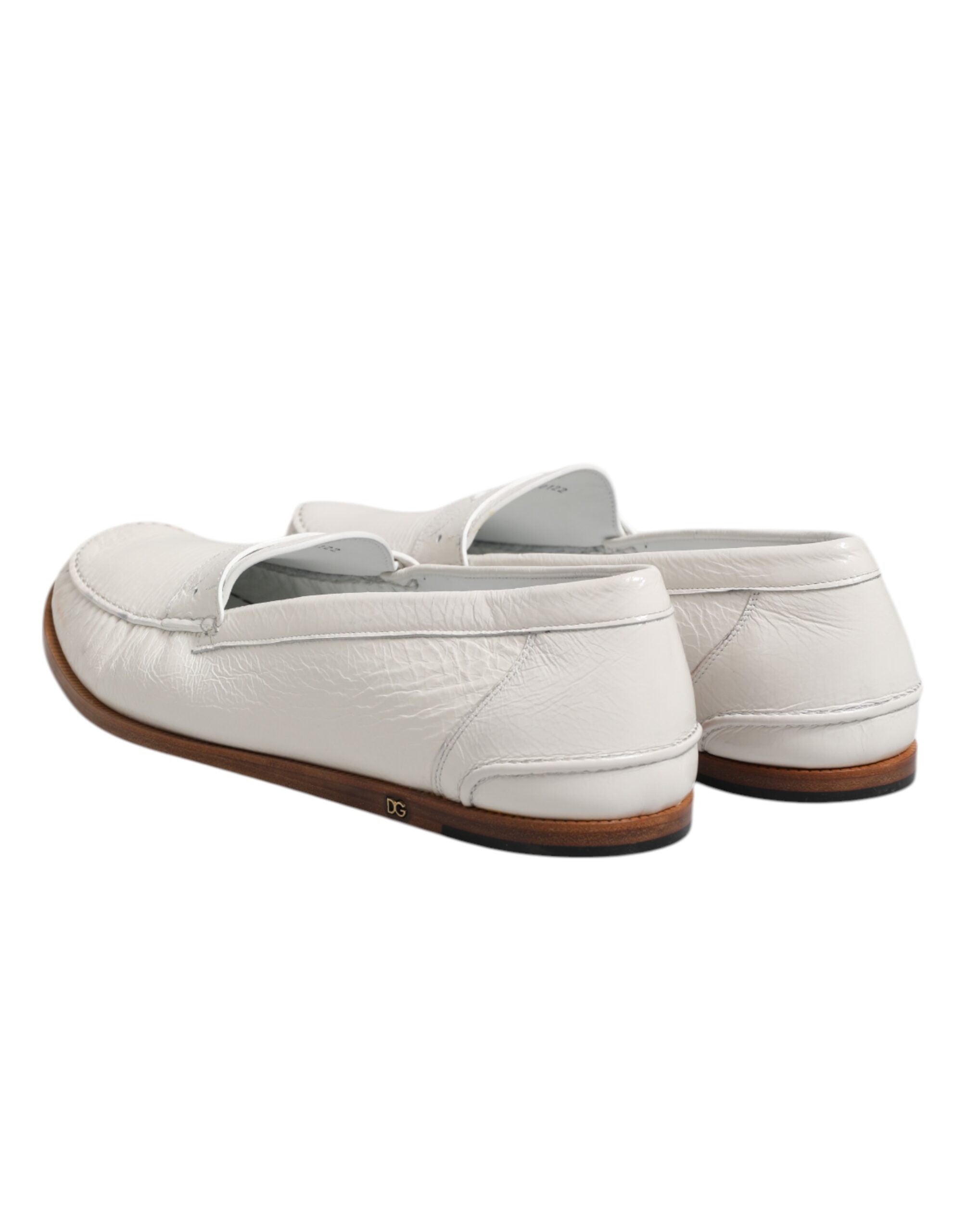 Chaussures mocassins en cuir blanc Dolce & Gabbana, chaussons slip-on élégants pour homme ou femme.