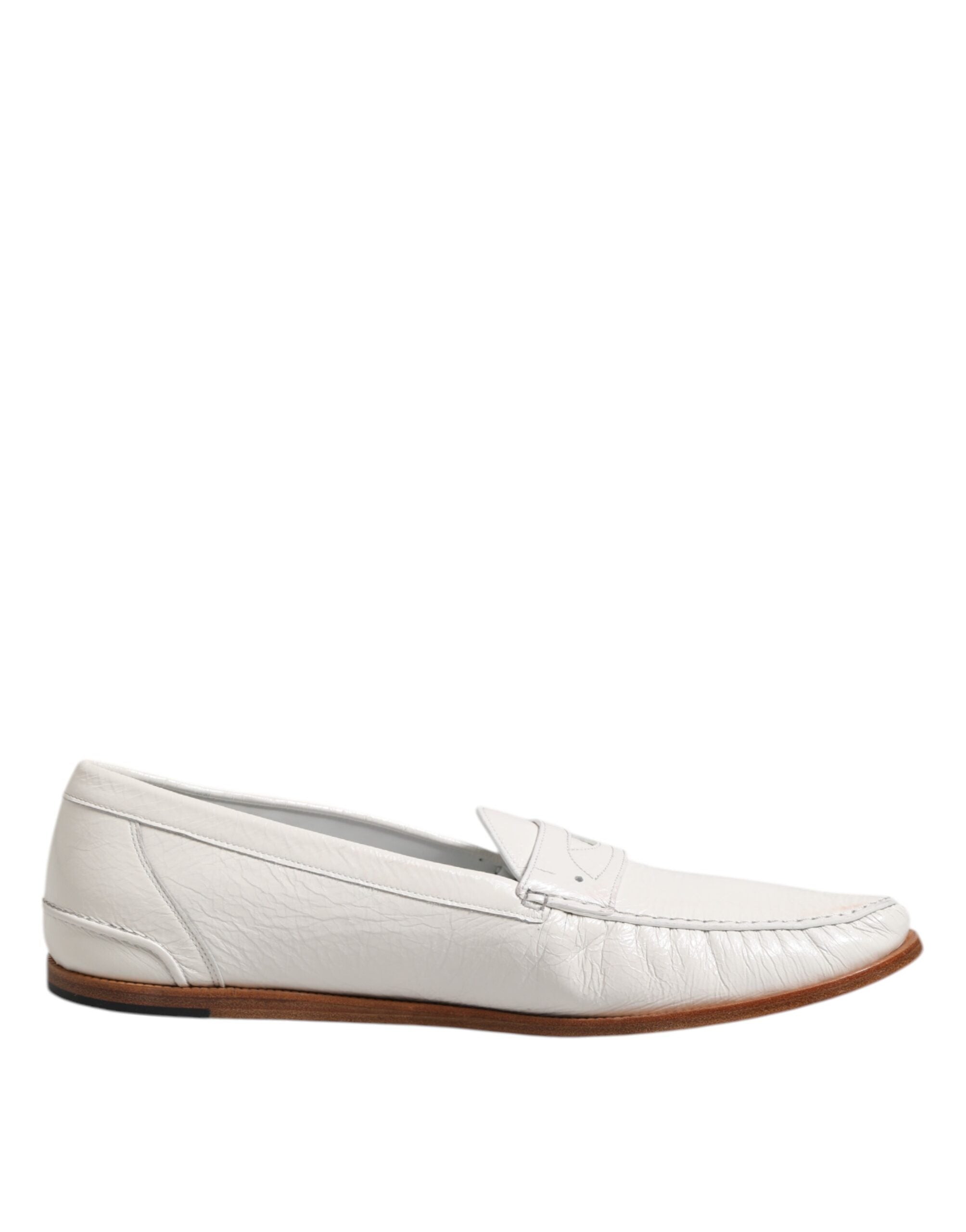 Mocassins en cuir blanc Dolce & Gabbana, chaussures slip-on élégantes pour femme, avec finition soignée et design classique.