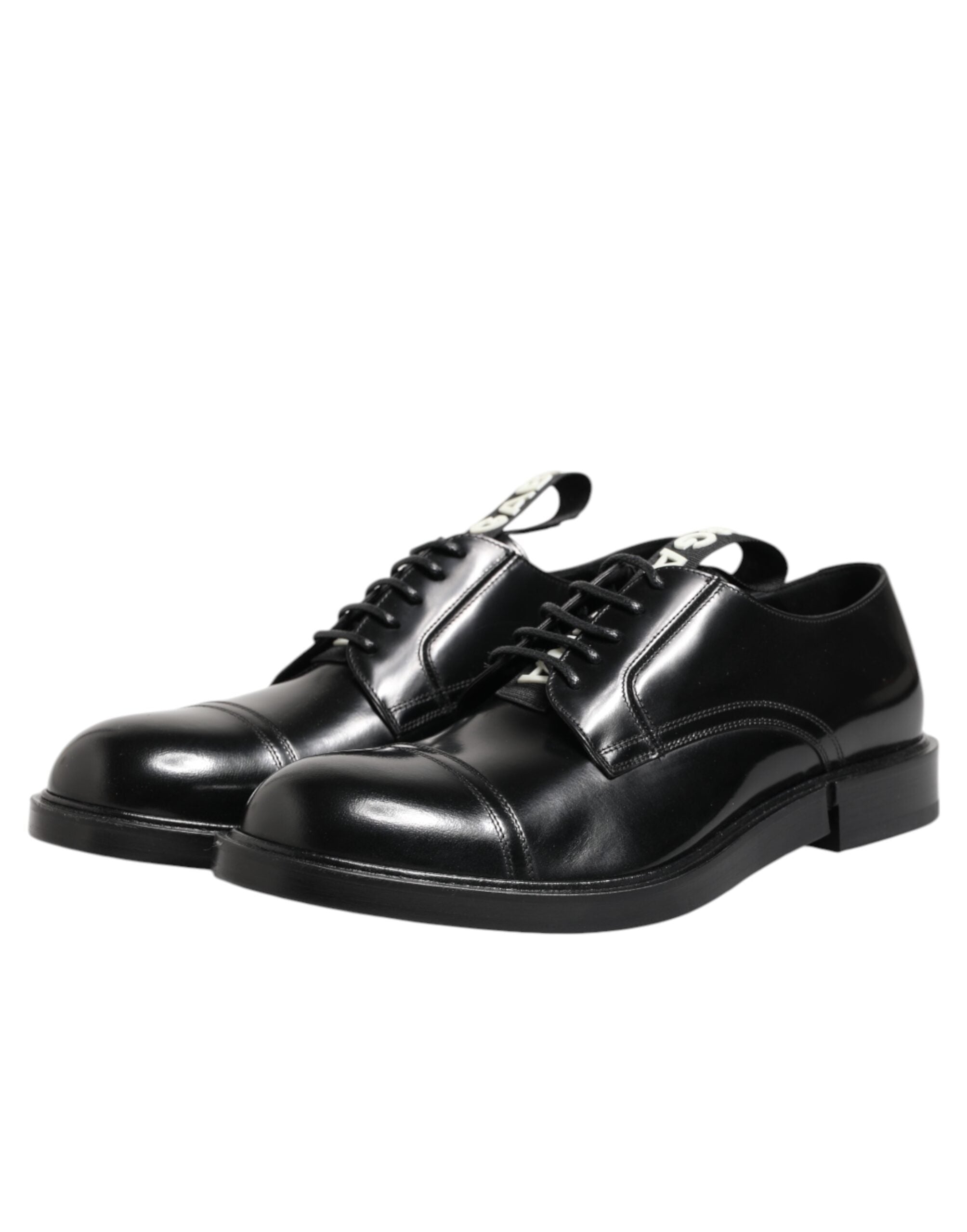 Chaussures formelles pour hommes Dolce & Gabbana en cuir noir avec laçages, élégantes et sophistiquées.