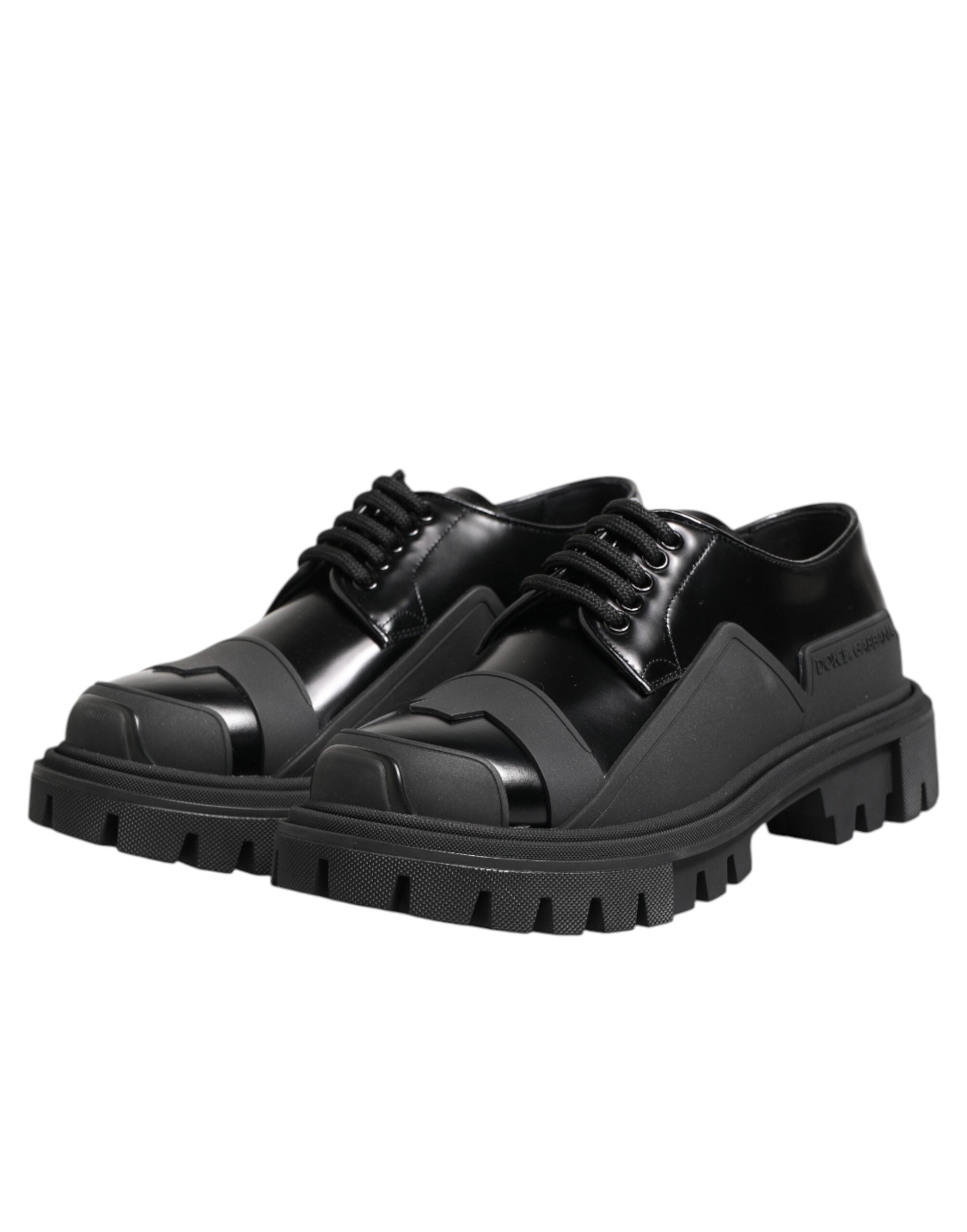 Chaussures Derby de trekking en cuir verni noir de Dolce & Gabbana, style élégant et robuste pour hommes.