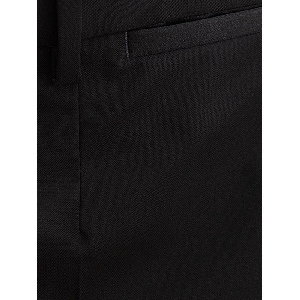 Pantalon habillé en laine noire de Dolce & Gabbana, style élégant et classique pour femmes ou hommes.