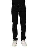 Jeans skinny en coton noir de Dolce & Gabbana, coupe ajustée, détails classiques, vu de face sur fond neutre.