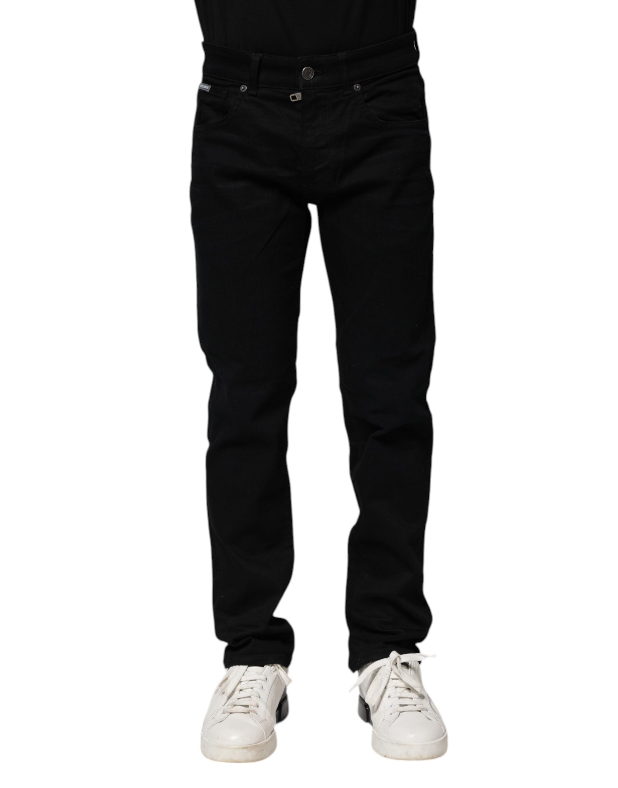Jeans skinny en coton noir de Dolce & Gabbana, coupe ajustée, détails classiques, vu de face sur fond neutre.