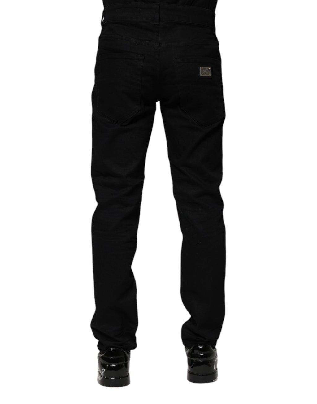 Jeans skinny en coton noir de Dolce & Gabbana, denim ajusté avec poches et coutures visibles.