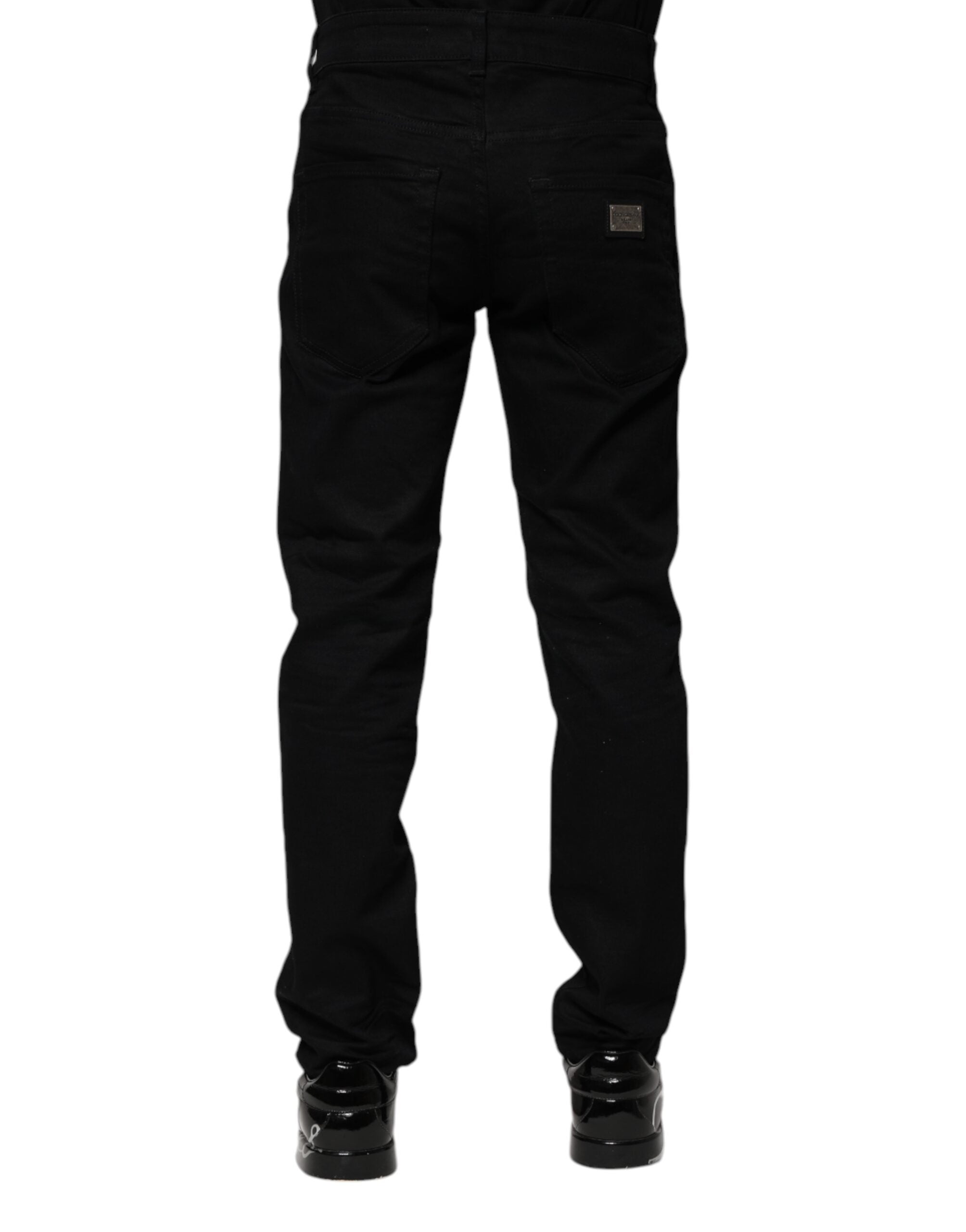 Jeans skinny en coton noir de Dolce & Gabbana, denim ajusté avec poches et coutures visibles.