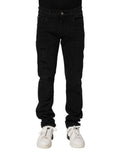 Jeans homme skinny en denim noir de Dolce & Gabbana, coton, coupe ajustée, détails modernes.