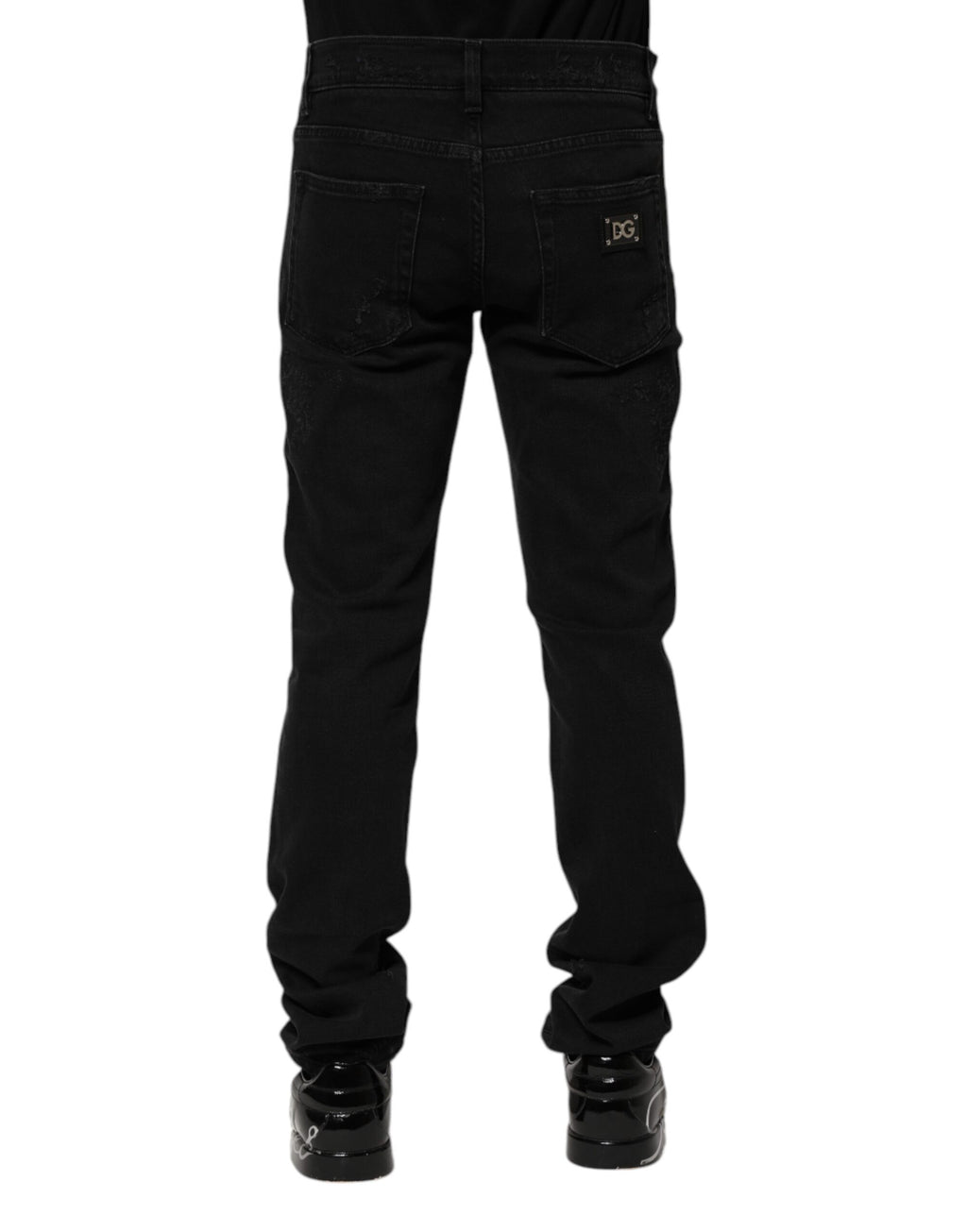 Jeans skinny en coton noir de Dolce & Gabbana pour homme, coupe ajustée et style moderne.
