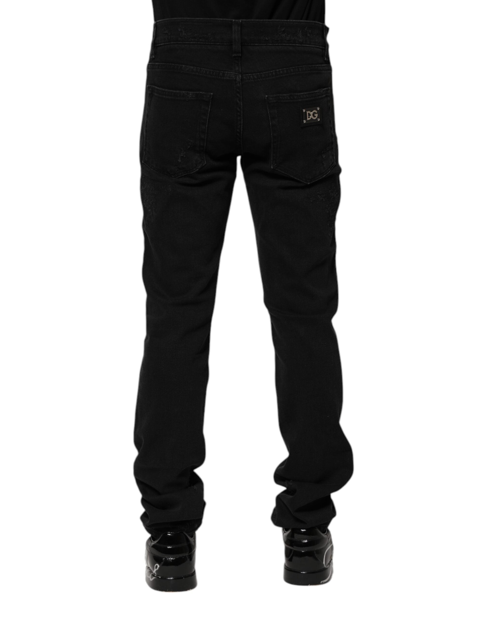 Jeans skinny en coton noir de Dolce & Gabbana pour homme, coupe ajustée et style moderne.