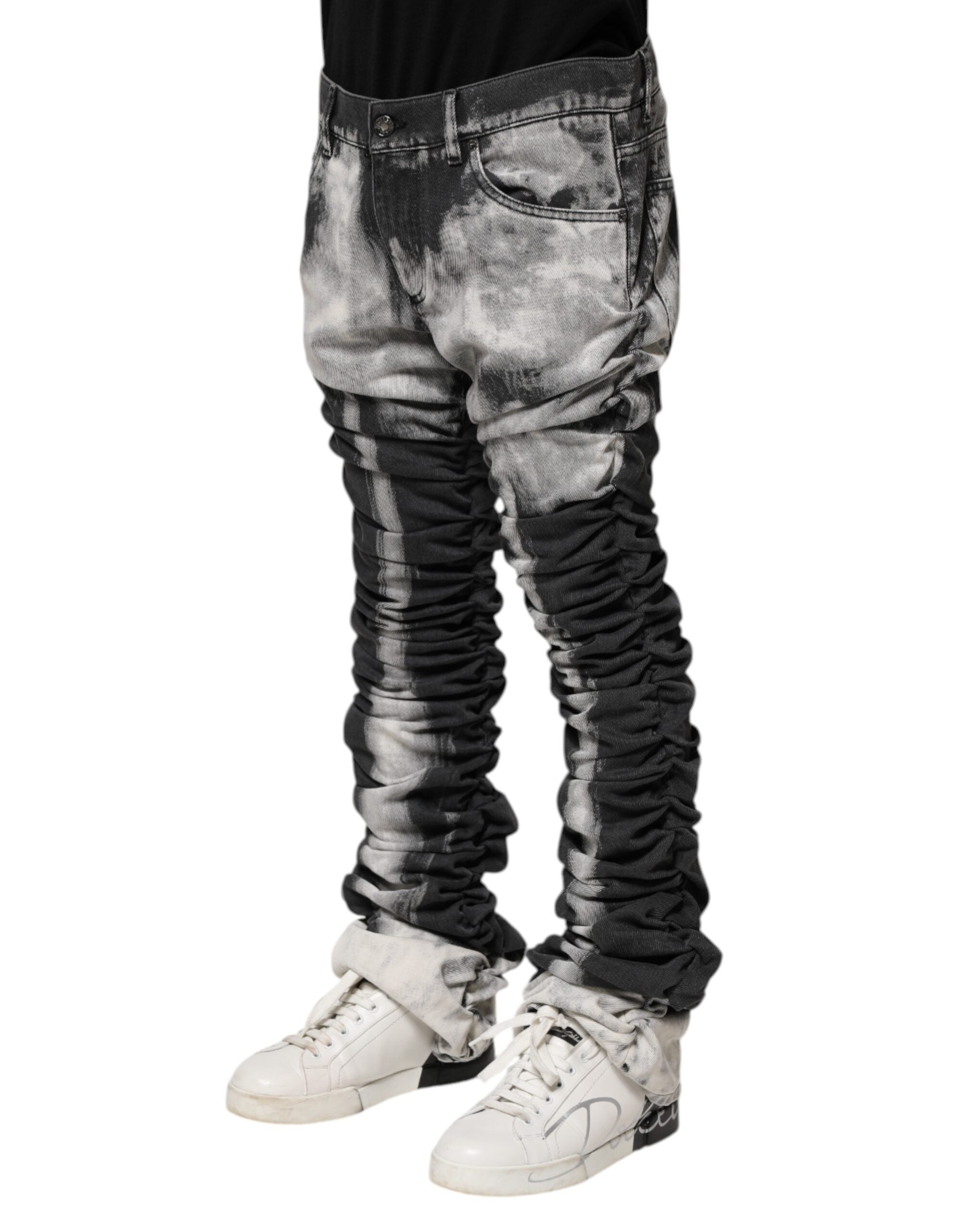 Jeans droits délavés à la couleur tie-dye noire de Dolce & Gabbana, en denim tendance et moderne.