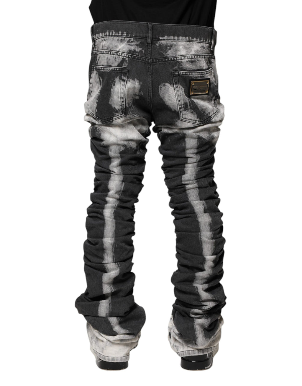 Jeans Dolce & Gabbana en denim droit à motif tie-dye noir, style décontracté et tendance.