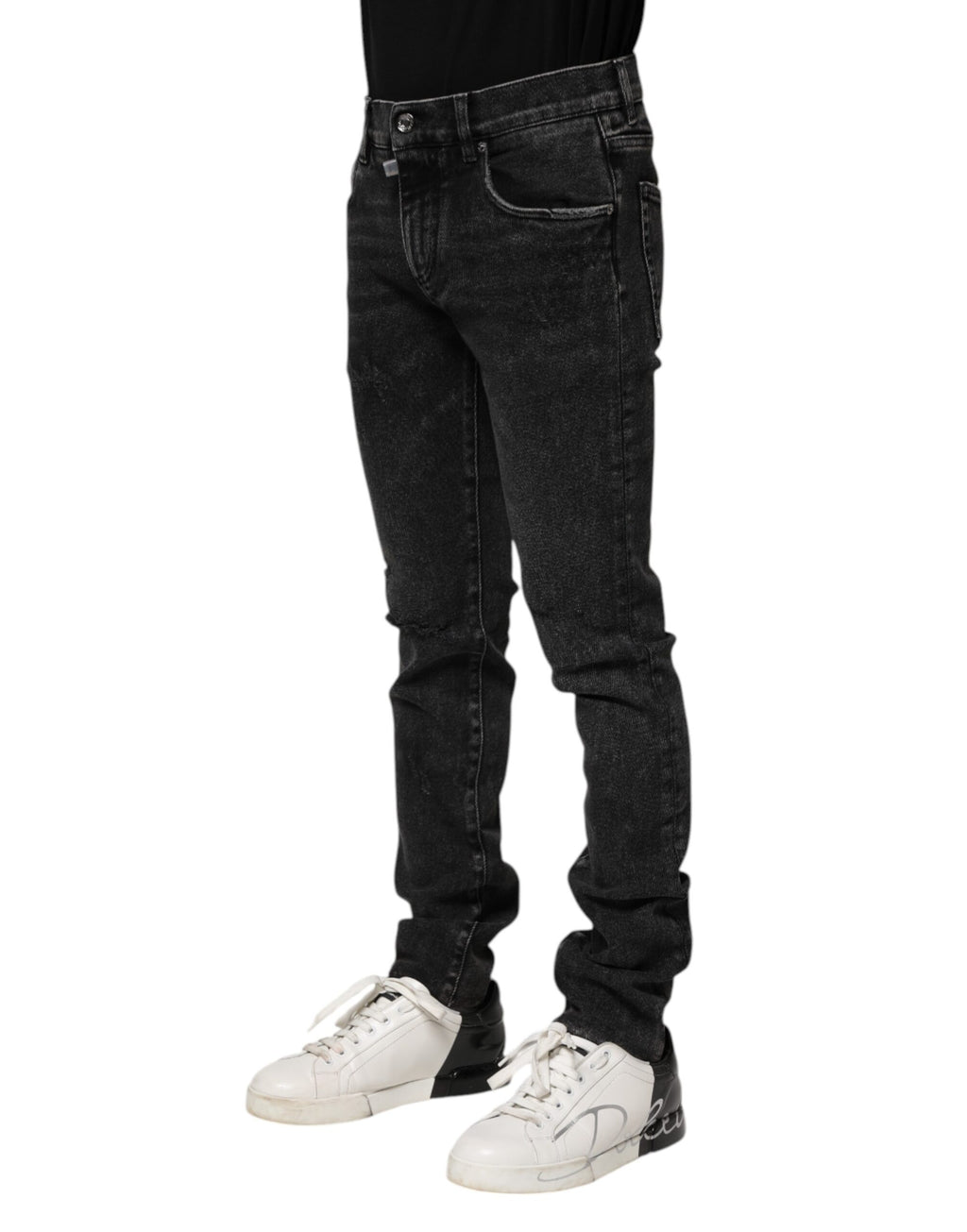 Jeans slim en coton noir de Dolce & Gabbana pour homme, coupe ajustée et style décontracté, visibles sur l'image.