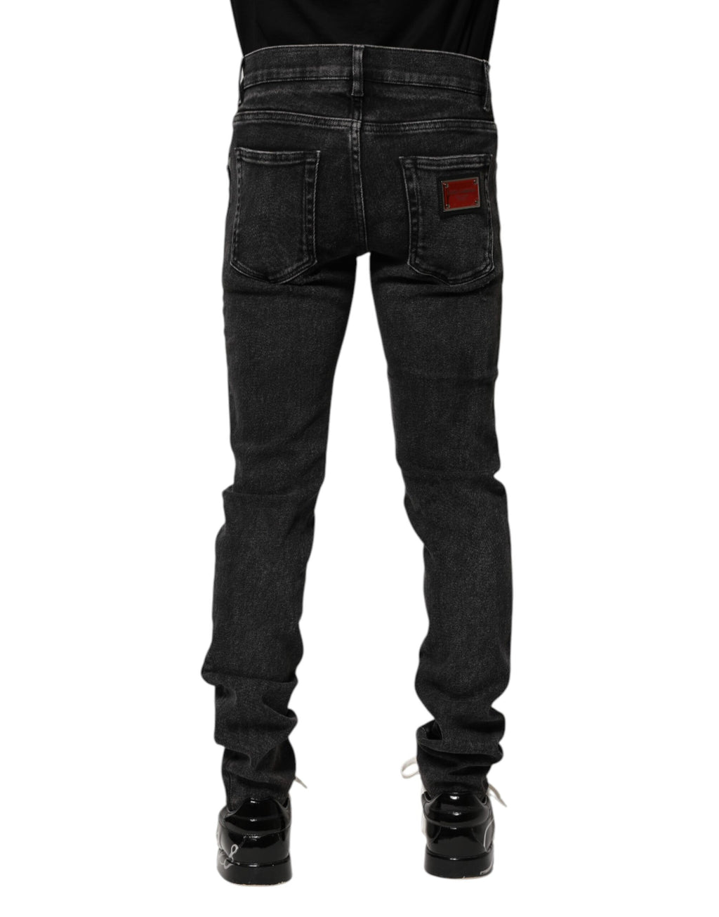 Jeans slim en coton noir de Dolce & Gabbana pour homme, style denim skinny avec détails modernes.