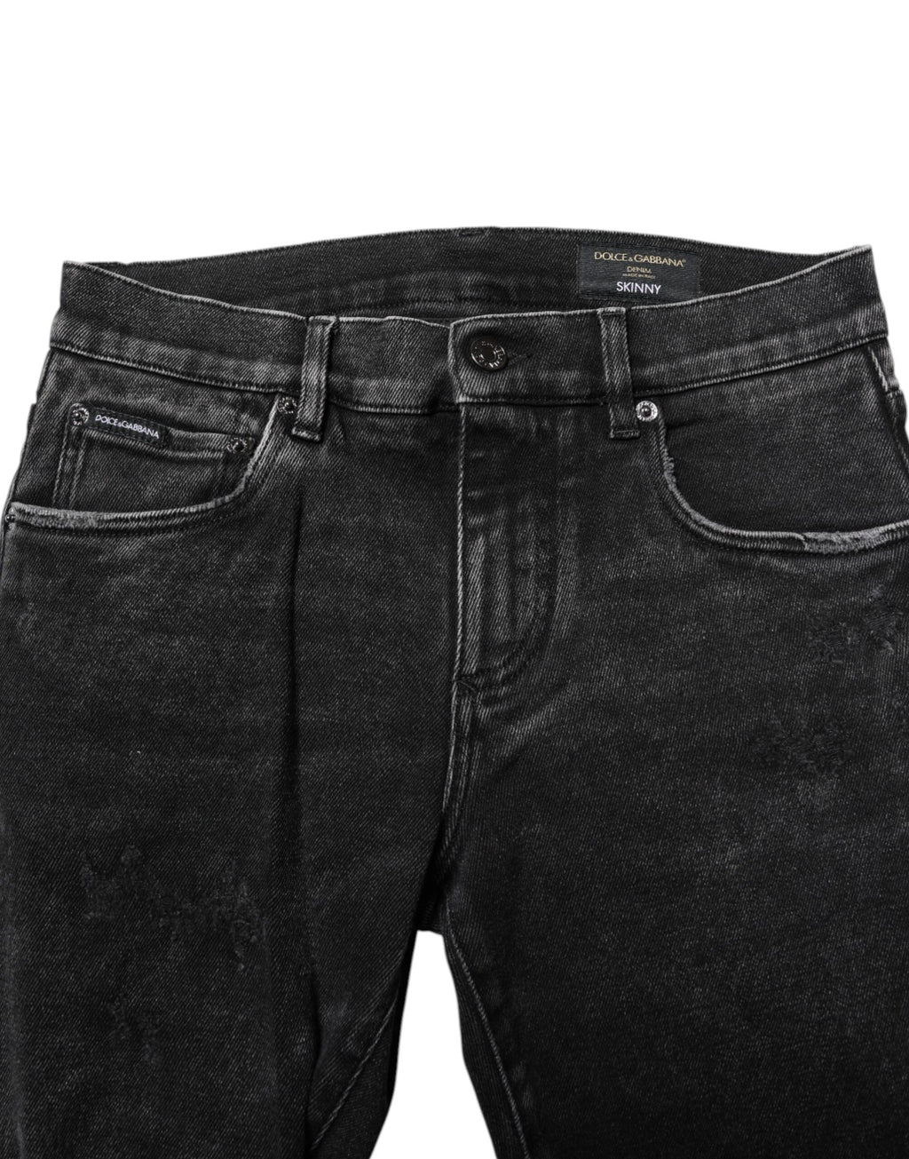 Jeans slim en coton noir de Dolce & Gabbana pour homme, denim ajusté avec détails modernes.