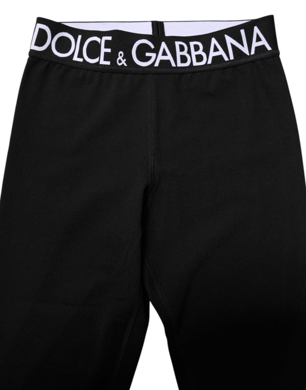 Leggings homme Dolce & Gabbana en nylon noir et argent, coupe skinny avec détails modernes et élégants.