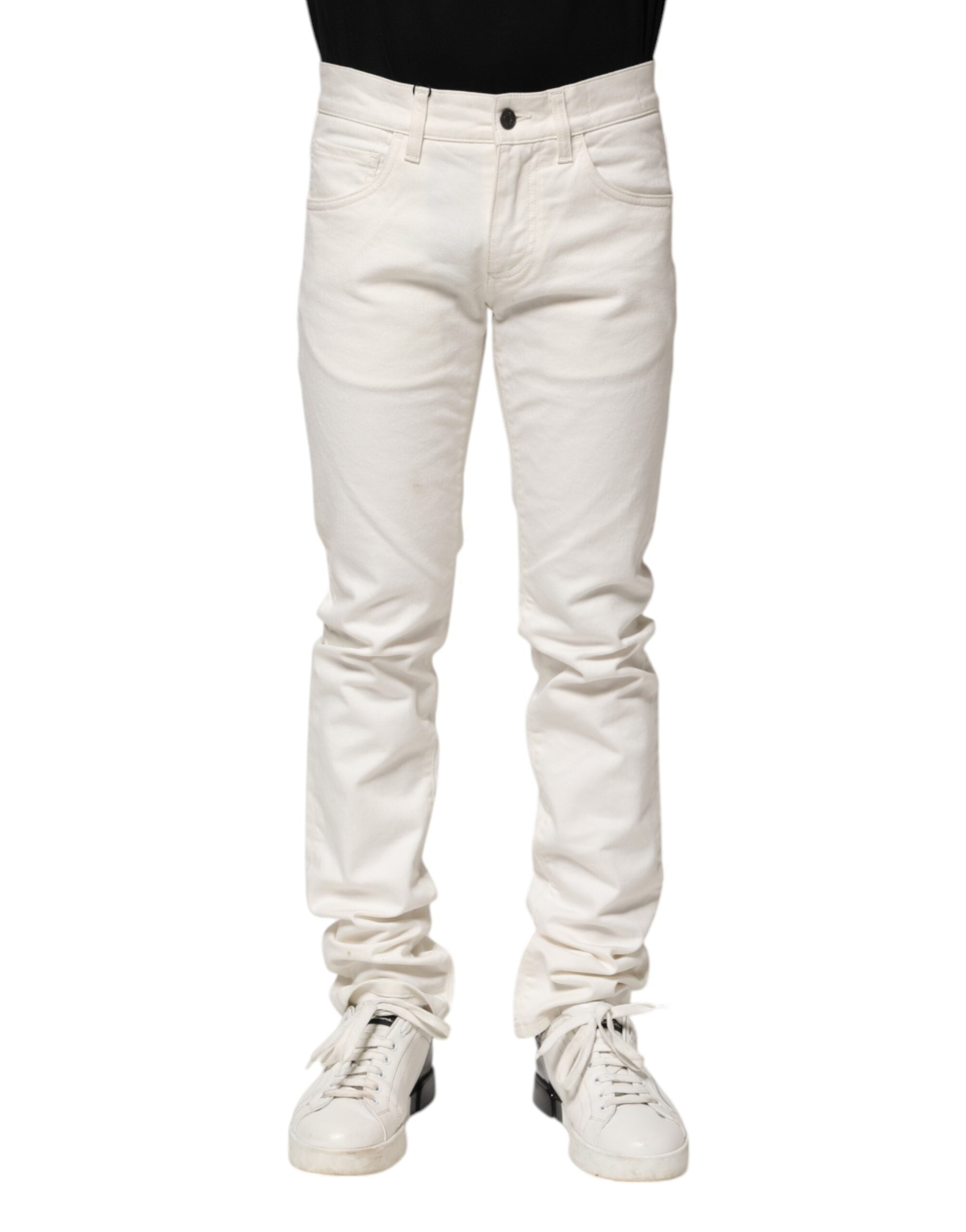 Jeans skinny en coton blanc Dolce & Gabbana pour homme, coupe ajustée et détails classiques, vue en gros plan.