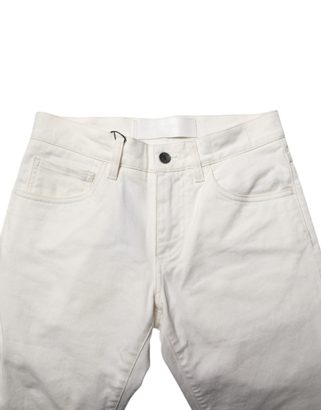 Jeans slim en coton blanc pour homme de Dolce & Gabbana, denim ajusté avec détails modernes.
