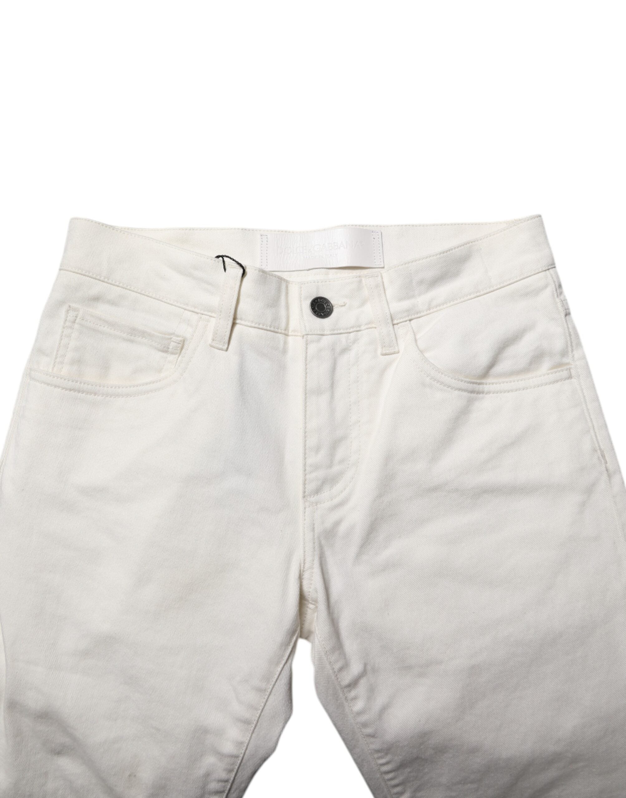 Jeans slim en coton blanc pour homme de Dolce & Gabbana, denim ajusté avec détails modernes.