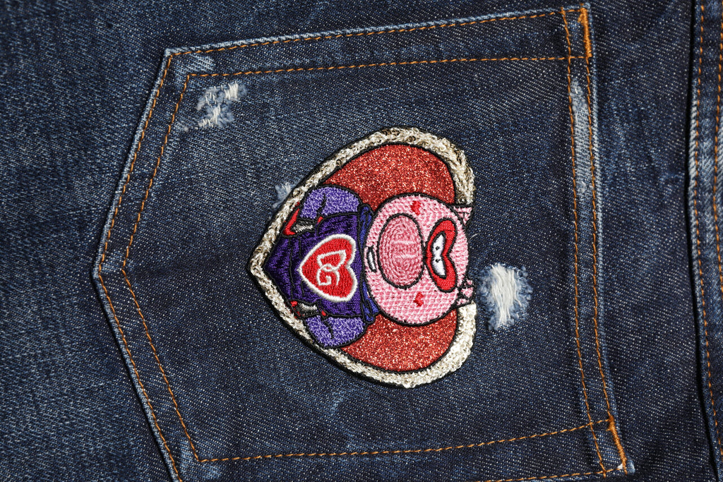 Jean skinny en denim déchiré bleu foncé de Dolce & Gabbana, coupe ajustée et style décontracté.