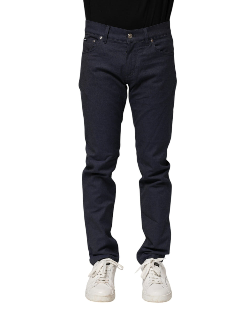 Jeans skinny en denim coton bleu foncé de Dolce & Gabbana, coupe ajustée et détails classiques visibles sur l'image.