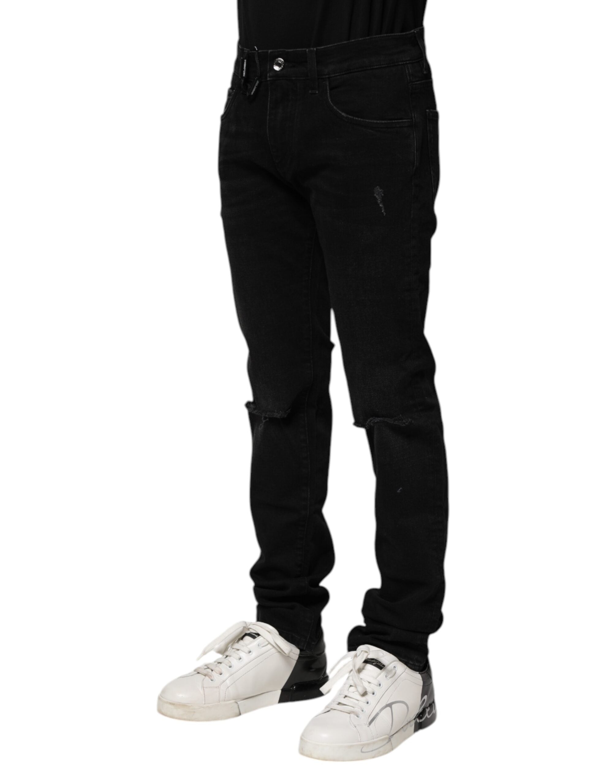 Jeans slim en coton noir de Dolce & Gabbana pour homme, coupe skinny, affichant une texture en denim.