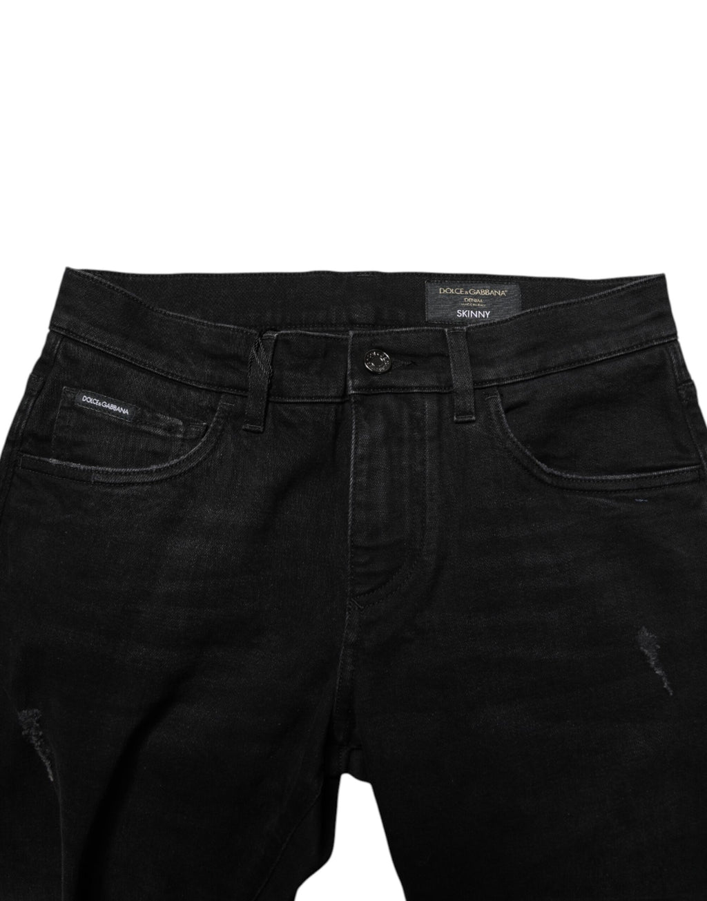 Jeans homme skinny en coton noir Dolce & Gabbana, denim ajusté, avec détails modernes et fermeture éclair visible.