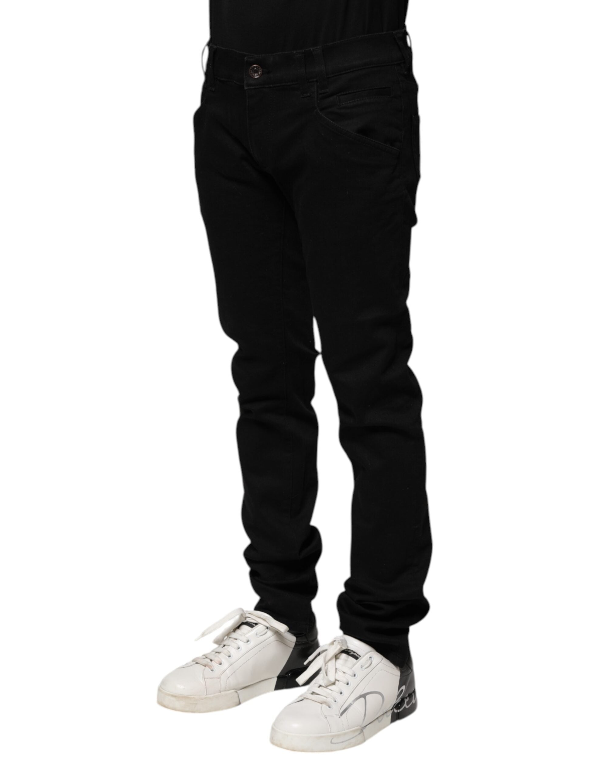 Jeans homme Dolce & Gabbana en coton noir skinny, coupe ajustée et moderne, visible sur une mannequin.