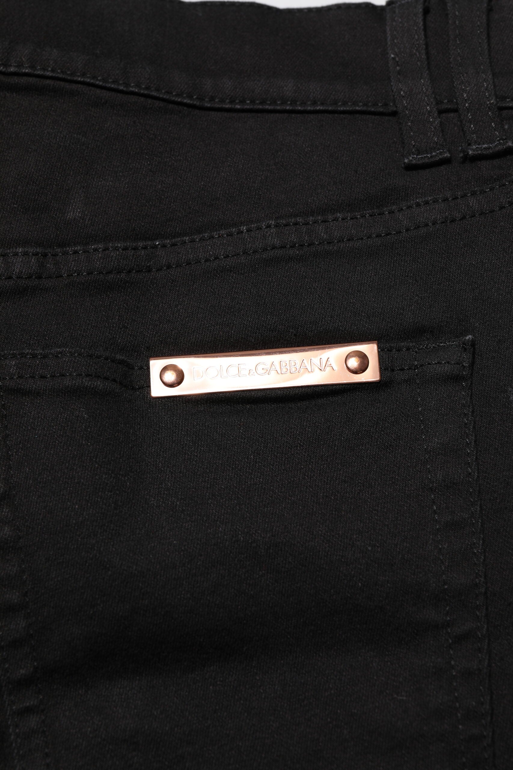 Jeans pour hommes Dolce & Gabbana en coton noir, coupe skinny, denim, visible dans l'image.