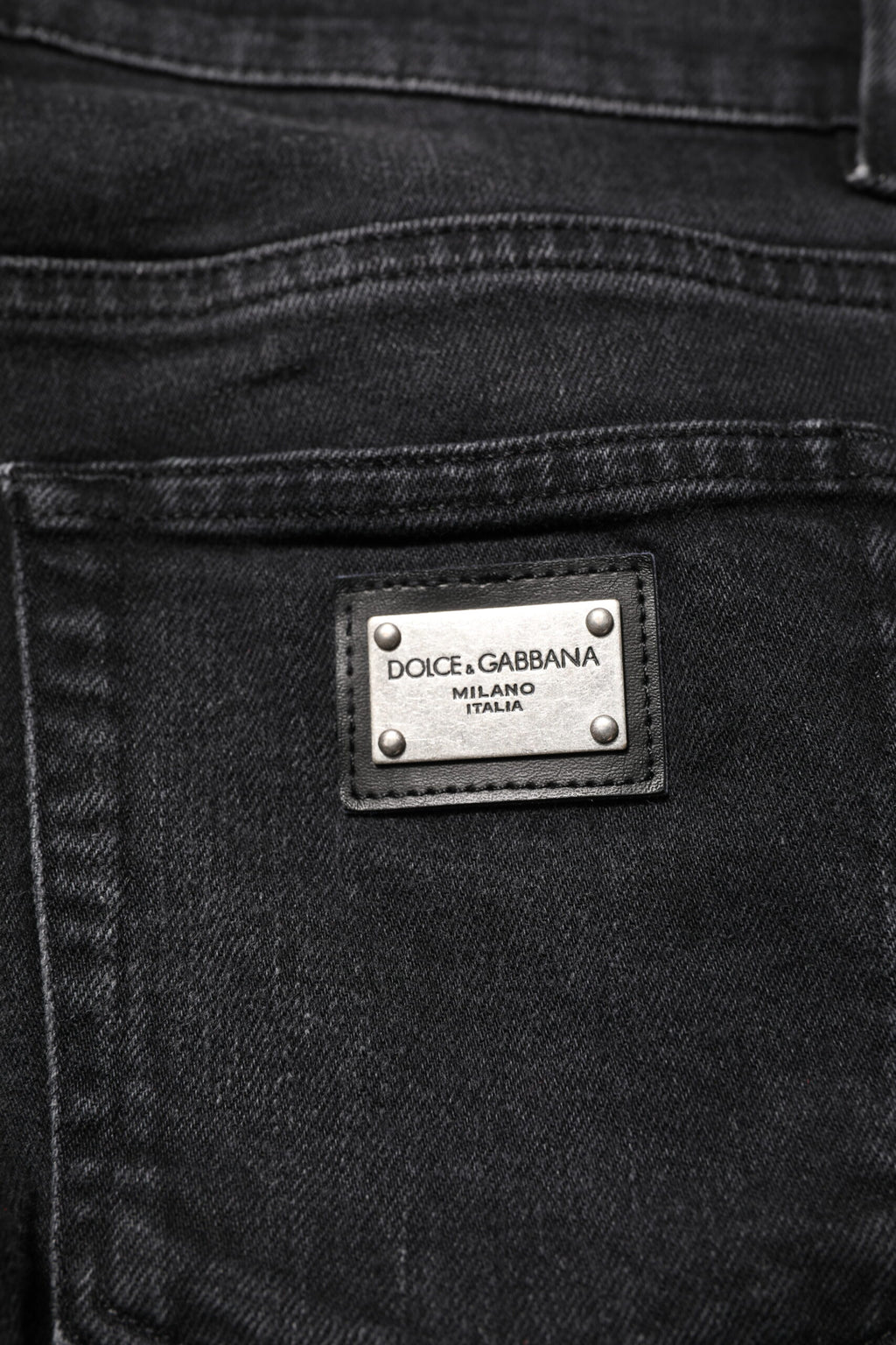 Jeans slim en coton noir de Dolce & Gabbana pour homme, coupe skinny, détails en denim.