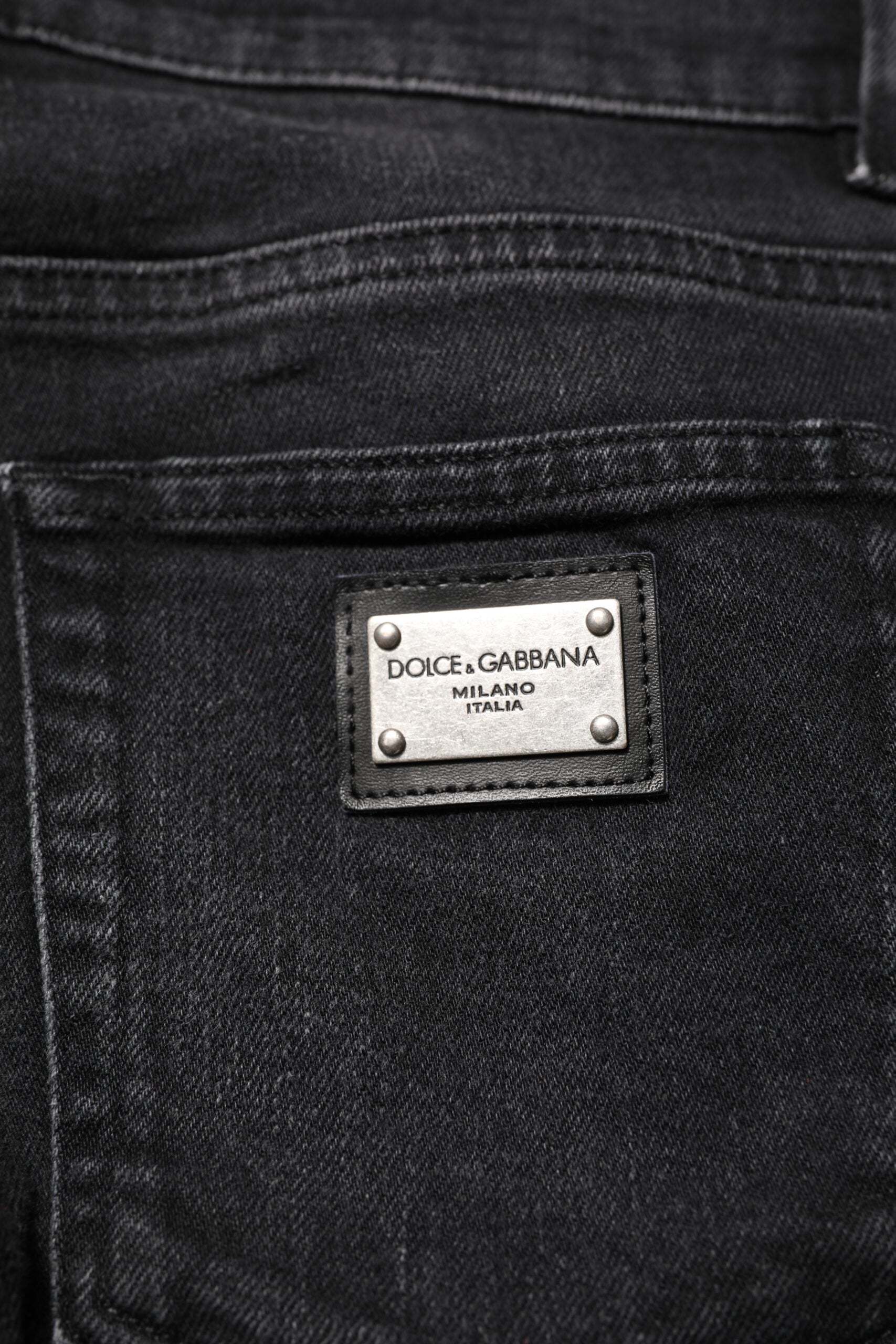 Jeans slim en coton noir de Dolce & Gabbana pour homme, coupe skinny, détails en denim.
