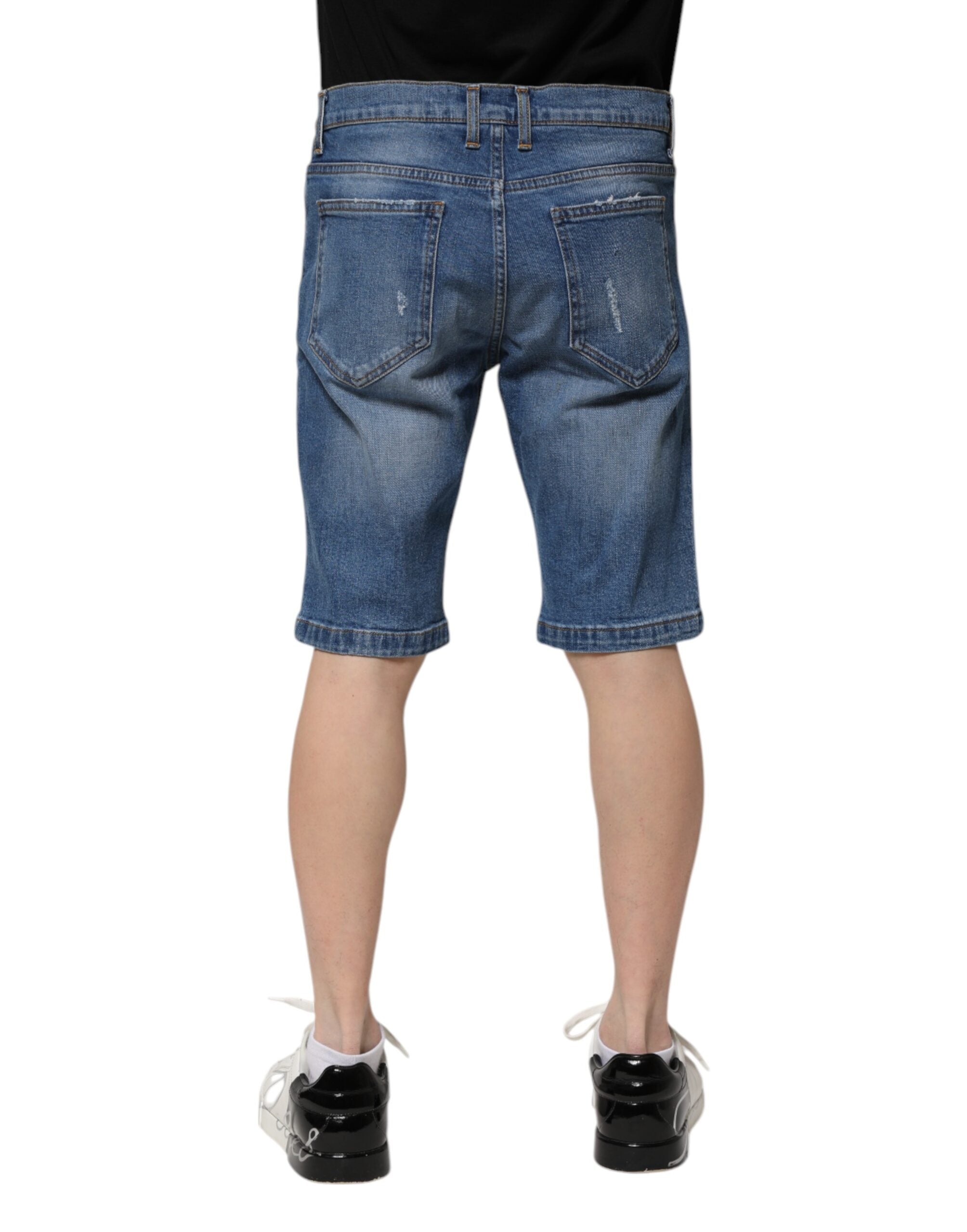 Shorts bermuda en denim bleu pour homme de Dolce & Gabbana, en coton stretch, style décontracté et élégant.