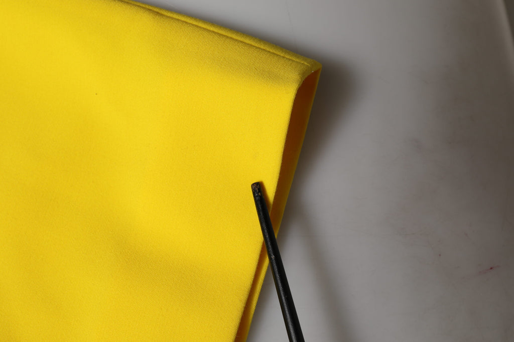 Robe midi sans manches en polyester jaune de Dolce & Gabbana, coupe ajustée et élégante, idéale pour une tenue sophistiquée.