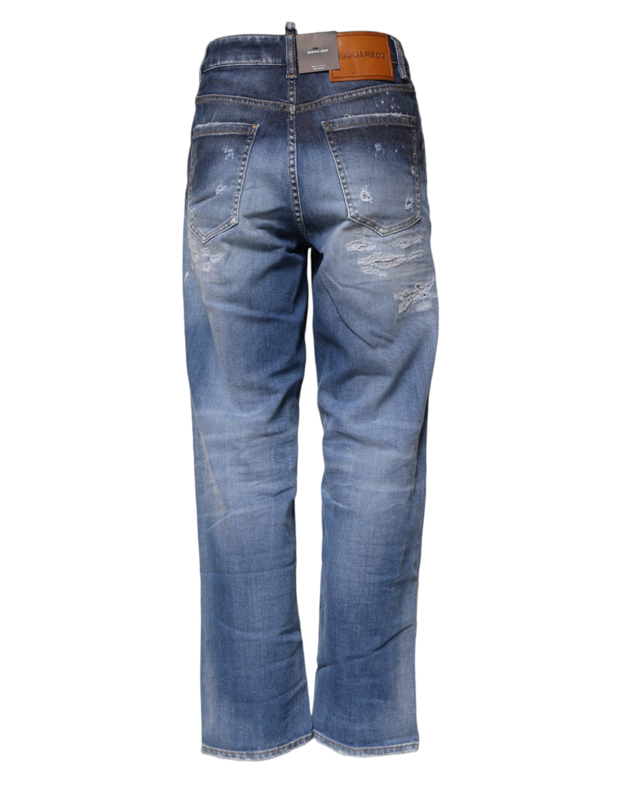 Jeans en denim blanc cassé Dsquared², coupe droite, taille mi-haute, avec déchirures et style décontracté.