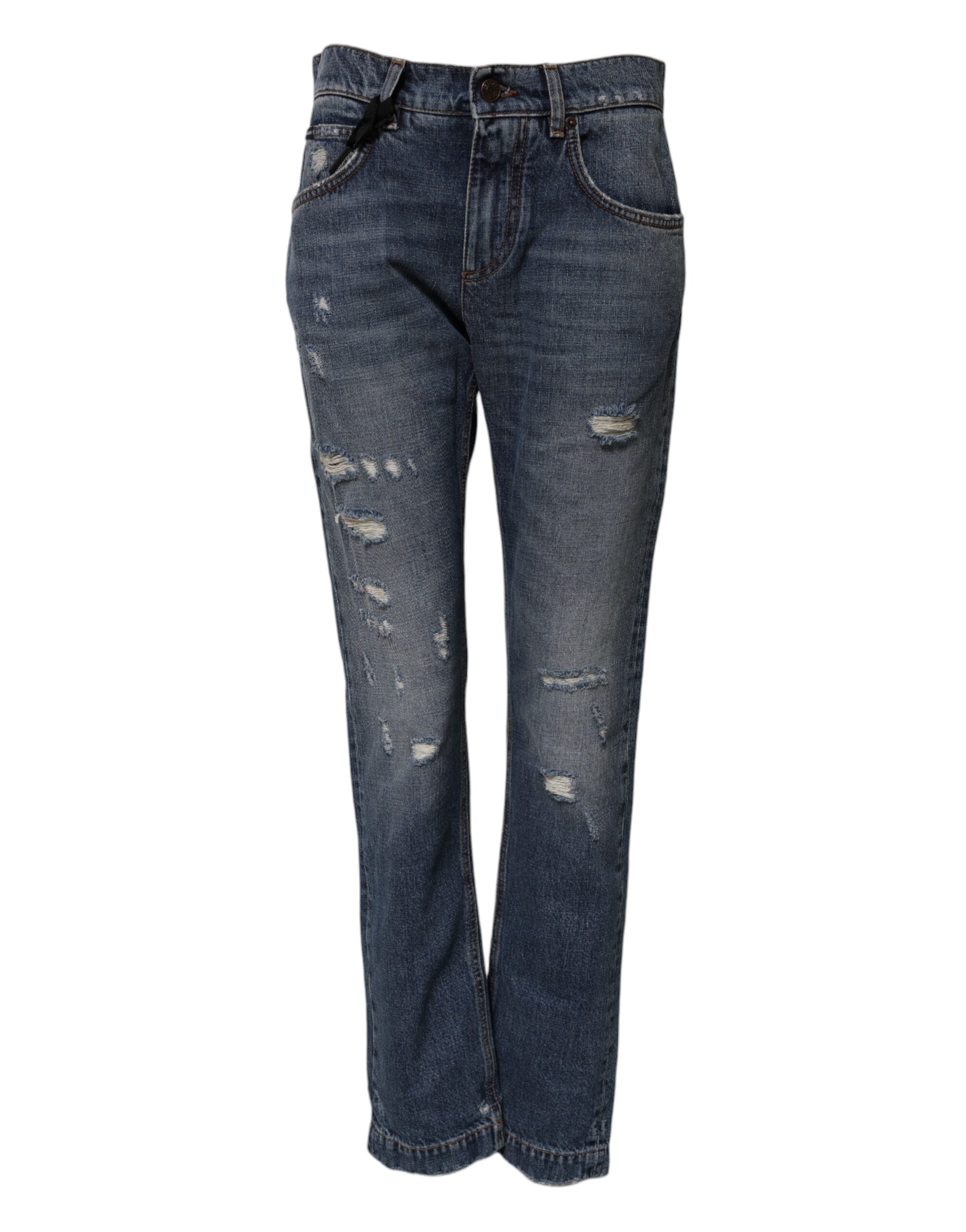 Jeans denim boyfriend en coton bleu Dolce & Gabbana, déchirés et tendance, avec coupe décontractée et détails usés visibles.