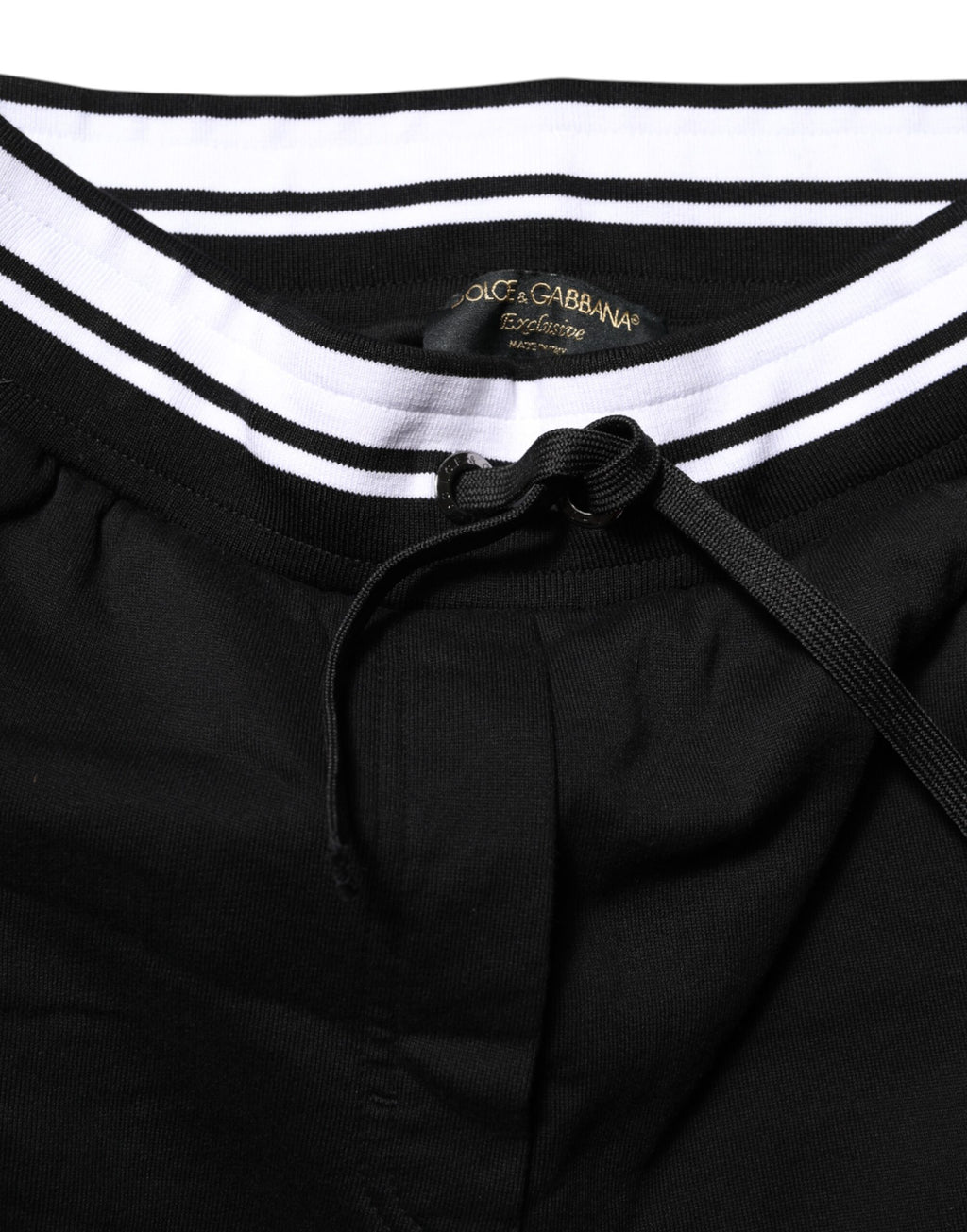 Pantalons joggers en coton noir Dolce & Gabbana à taille moyenne, style décontracté et moderne, visible sur l'image.