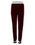 Pantalons Dolce & Gabbana en viscose rouge avec logo DG à la taille mi-hauteur, image montrant la coupe et le tissu.