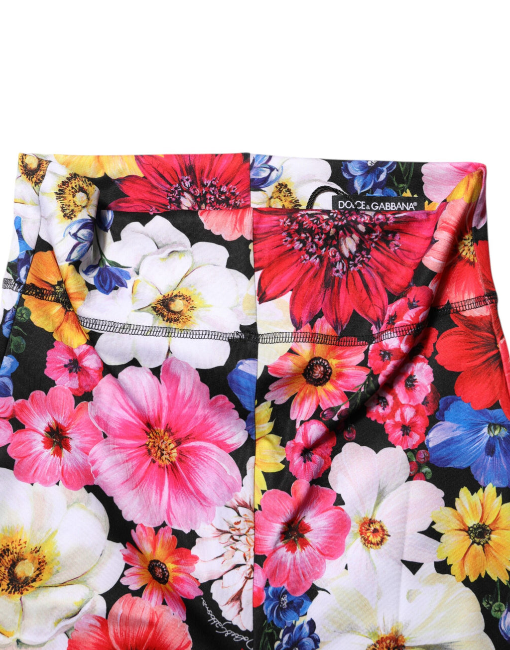 Leggings Dolce & Gabbana à fleurs multicolores, taille haute, en tissu extensible, mode élégante et confortable.