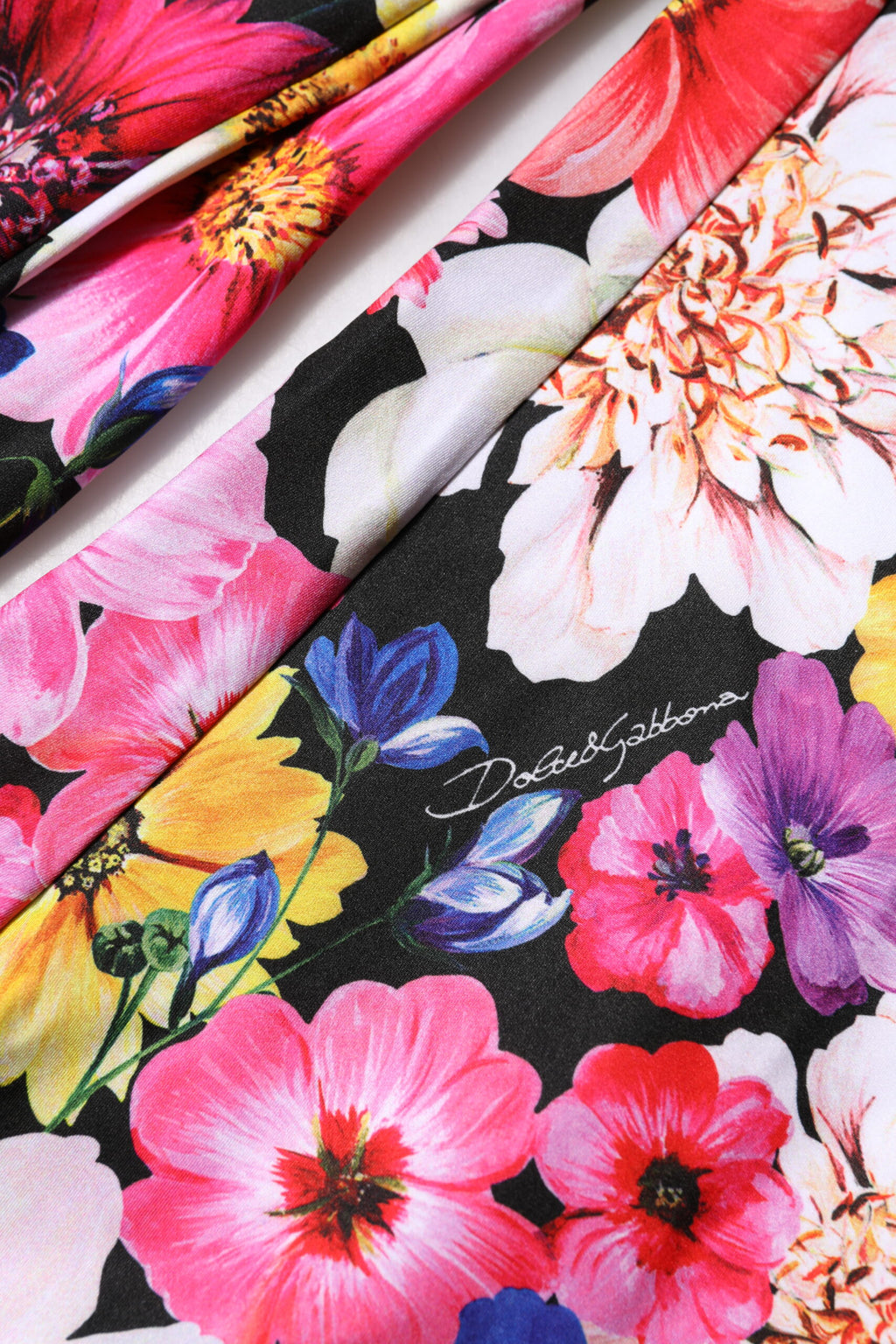 Leggings taille haute Dolce & Gabbana à motifs floraux multicolores, design élégant et coloré, en tissu extensible.