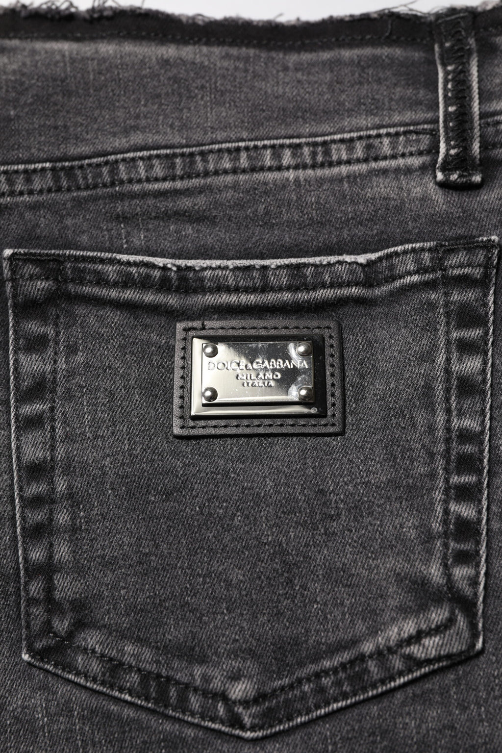 Jeans skinny gris en coton à taille moyenne de Dolce & Gabbana, coupe ajustée et style élégant.