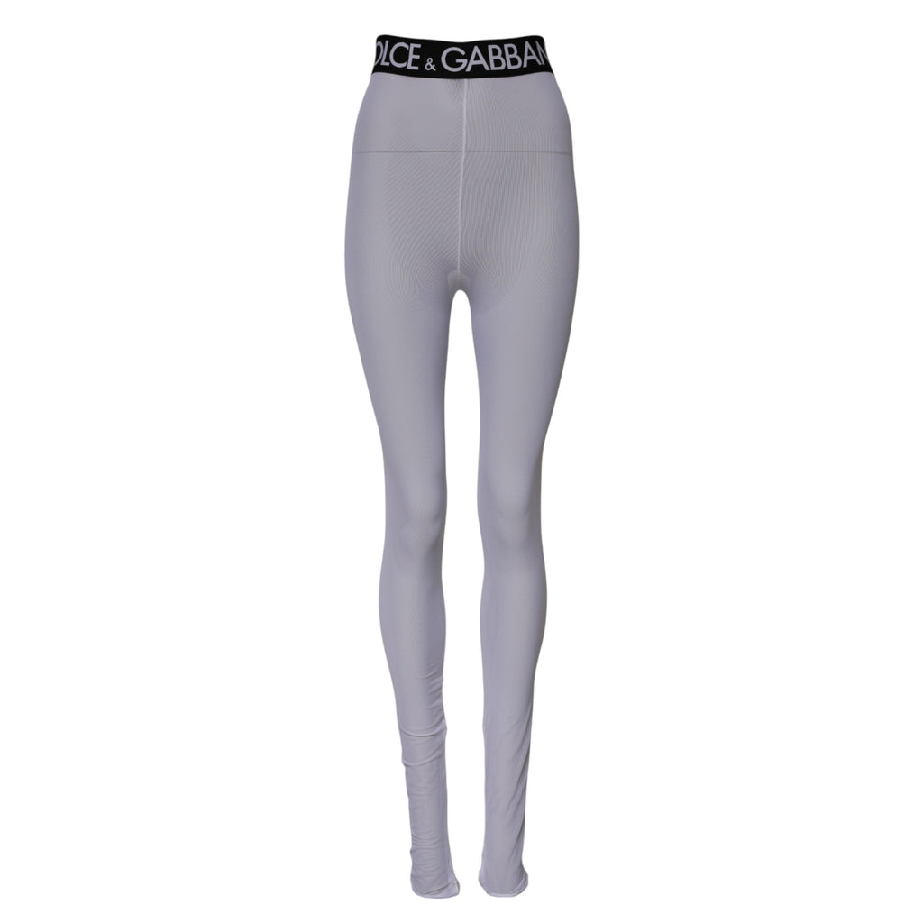 Légins gris en nylon Dolce & Gabbana avec logo DG, taille moyenne, coupe ajustée, visible en détail dans l'image.