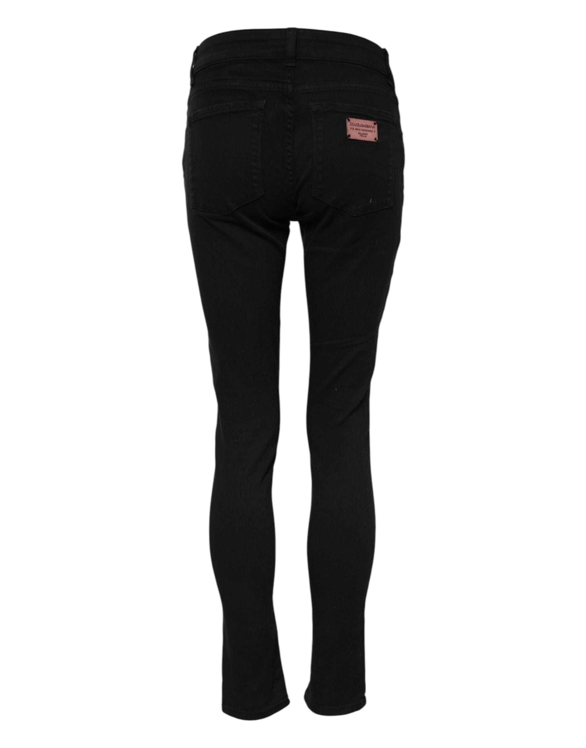 Jeans skinny en coton noir Dolce & Gabbana avec taille mi-haute, coupe ajustée et détails de denim.