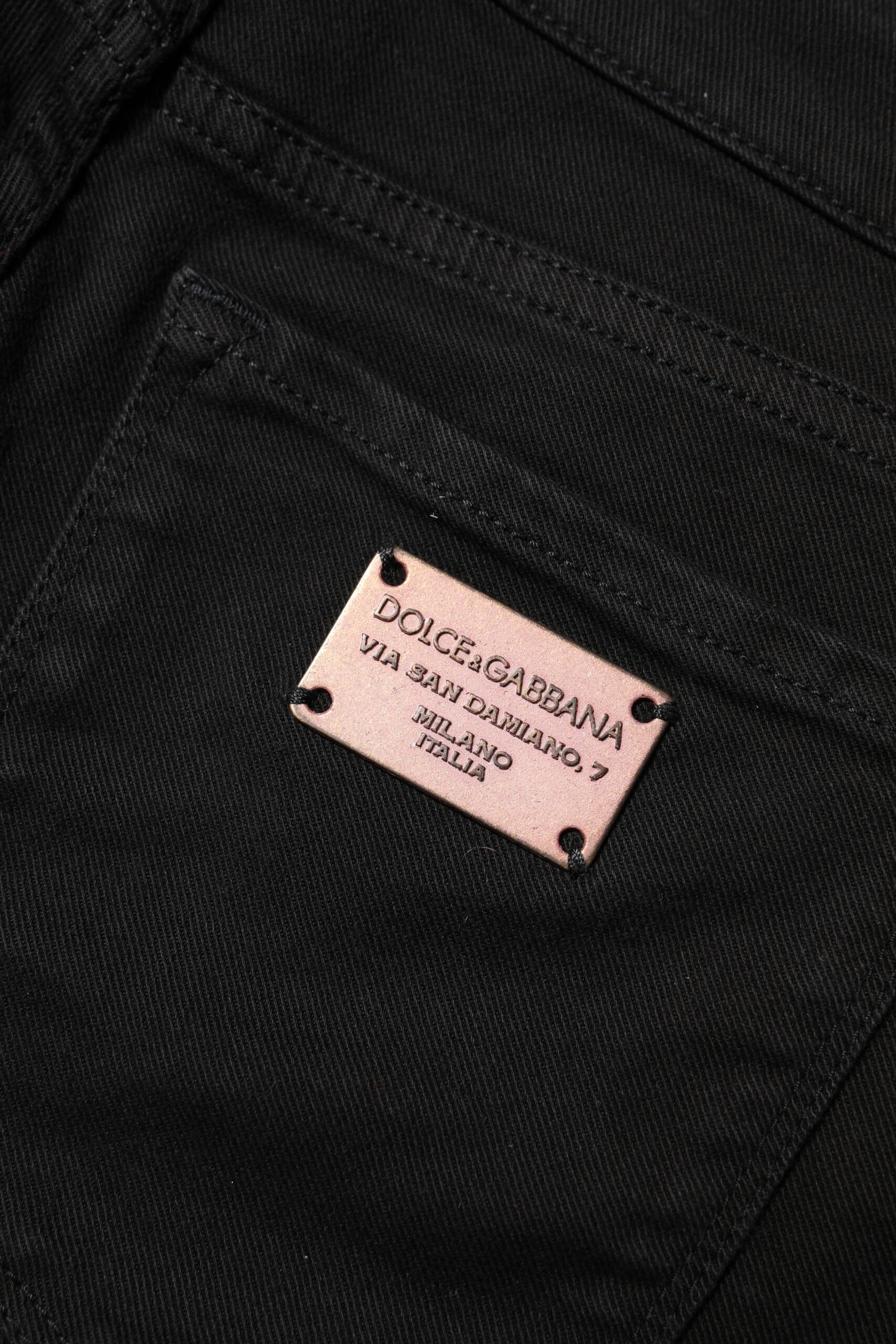 Jeans skinny en coton noir de Dolce & Gabbana, taille mi-haute, denim ajusté et tendance, visible avec poches et couture.