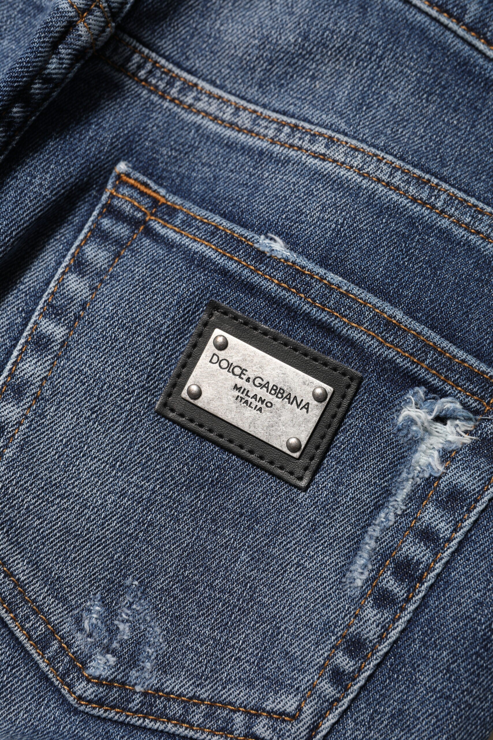 Jean en denim bleu lavé à taille haute de Dolce & Gabbana, coupe classique avec détails en coton.