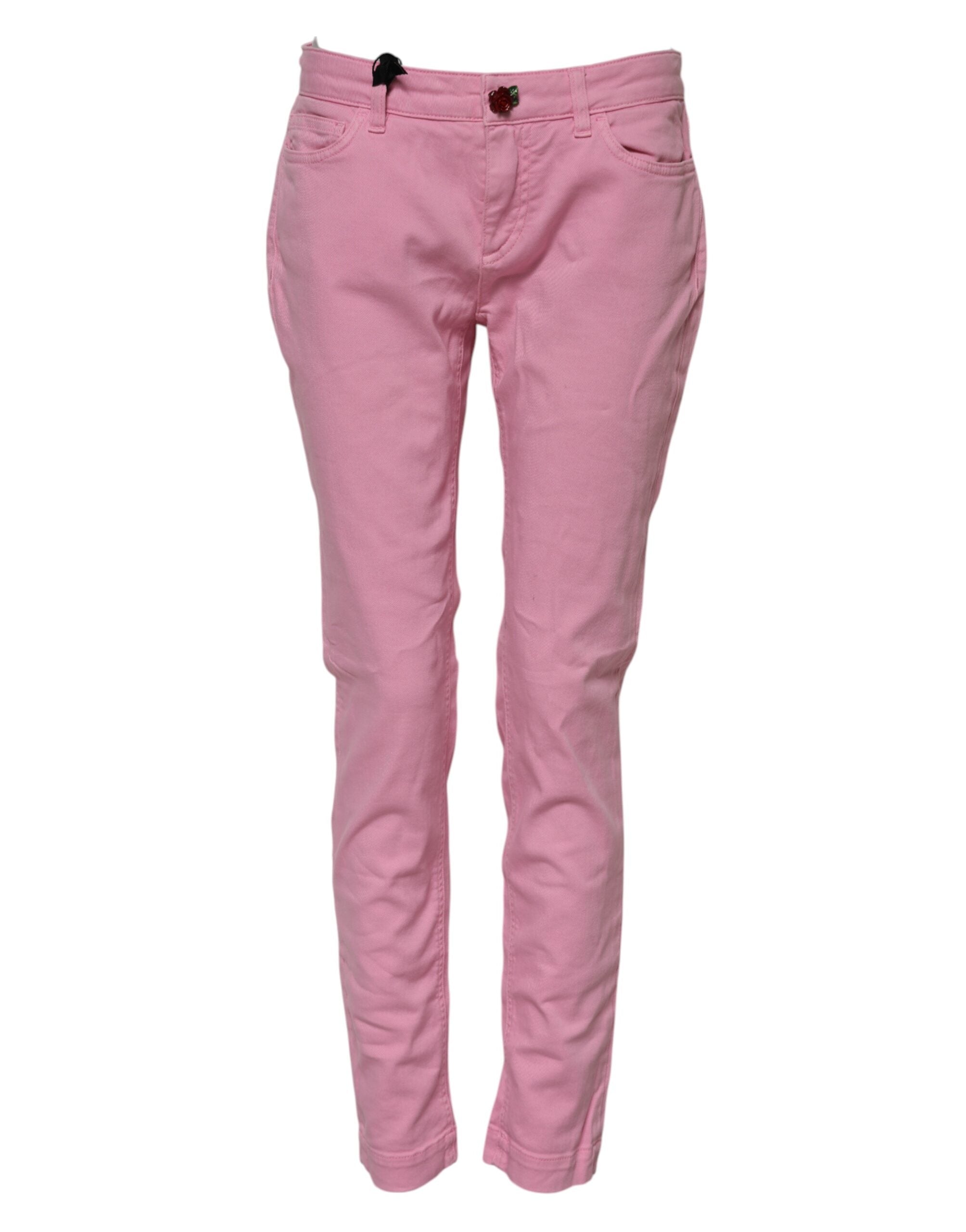 Jeans skinny en coton rose de Dolce & Gabbana, vêtement tendance pour femme, visible avec détails de couture et coupe ajustée.