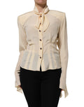 Chemise Dolce & Gabbana à col ascot jaune clair, boutonnée, tissu léger et élégant, vue de face.
