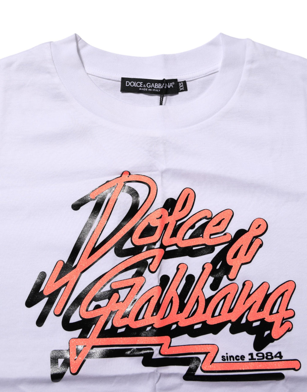 T-shirt blanc en coton Dolce & Gabbana avec imprimé graphique et col rond, vue de face.