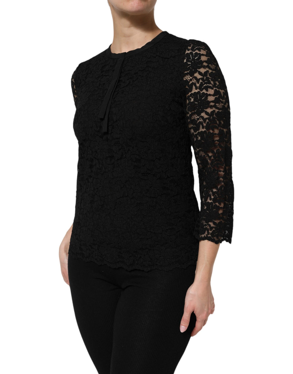 Chemise noire en nylon et dentelle Dolce & Gabbana avec manches longues, détails élégants et style sophistiqué.